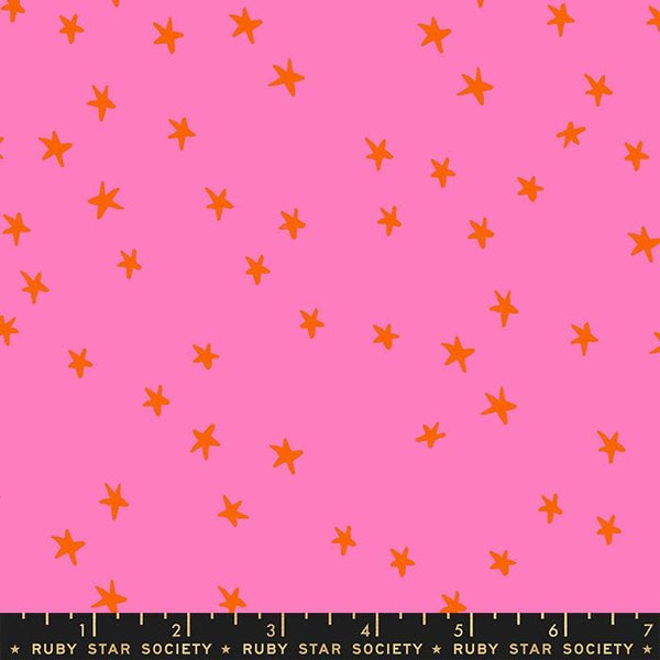 Image of the Starry Blenders Star Vivid Pink quilting cotton fabric by Alexia Abegg for Moda Fabrics. Features small scattered stars on a pink background. Cute Little Fabric Shop