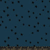 Image of the Starry Blenders Star Smoke quilting cotton fabric by Alexia Abegg for Moda Fabrics. Features small scattered stars on a blue background. Cute Little Fabric Shop
