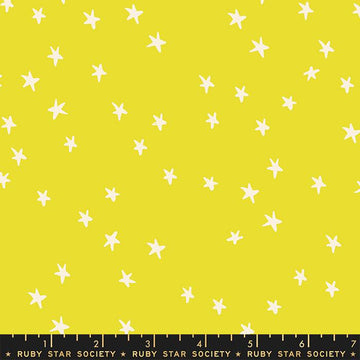 Image of the Starry Blenders Star Citron quilting cotton fabric by Alexia Abegg for Moda Fabrics. Features small scattered stars on a yellow background. Cute Little Fabric Shop