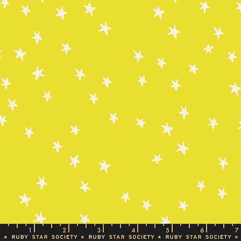 Image of the Starry Blenders Star Citron quilting cotton fabric by Alexia Abegg for Moda Fabrics. Features small scattered stars on a yellow background. Cute Little Fabric Shop