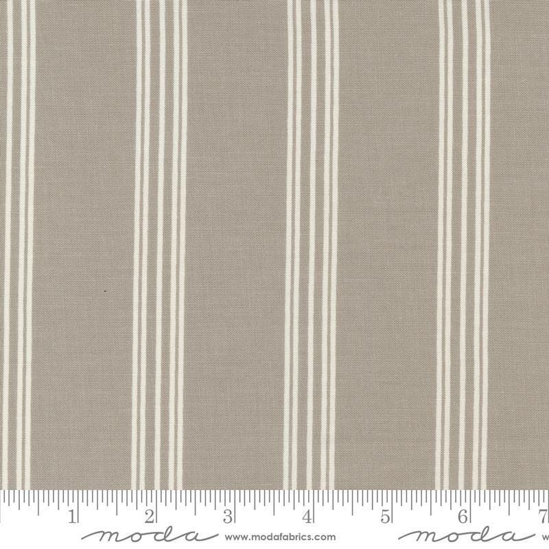 Image of the Seaglass Summer Stripes Sandstone quilting cotton fabric by Moda Fabrics. Features stripes on a tan background. Cute Little Fabric Shop
