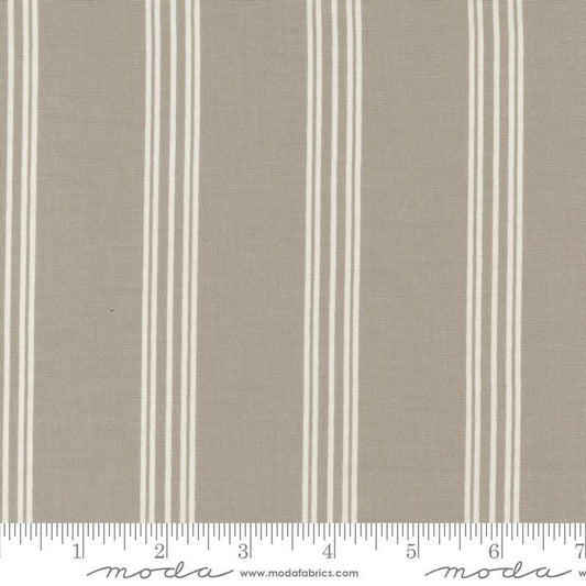 Image of the Seaglass Summer Stripes Sandstone quilting cotton fabric by Moda Fabrics. Features stripes on a tan background. Cute Little Fabric Shop