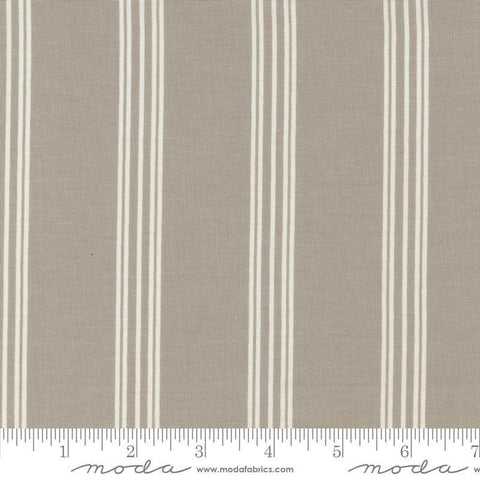 Image of the Seaglass Summer Stripes Sandstone quilting cotton fabric by Moda Fabrics. Features stripes on a tan background. Cute Little Fabric Shop