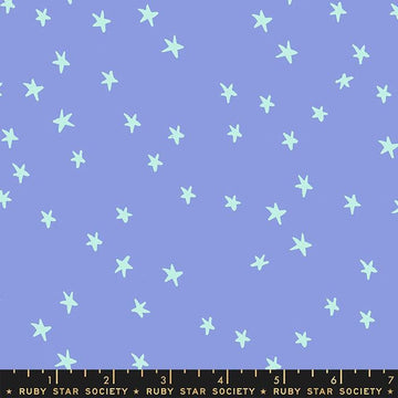 Image of the Starry Blenders Star Dusk quilting cotton fabric by Alexia Abegg for Moda Fabrics. Features small scattered stars on a purple background. Cute Little Fabric Shop