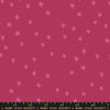 Image of the Starry Blenders Star Plum quilting cotton fabric by Alexia Abegg for Moda Fabrics. Features small scattered stars on a dark pink background. Cute Little Fabric Shop