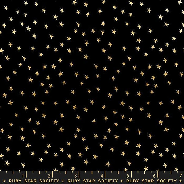 Image of the Starry Blenders Star Black Gold quilting cotton fabric by Alexia Abegg for Moda Fabrics. Features small scattered stars on a black background. Cute Little Fabric Shop