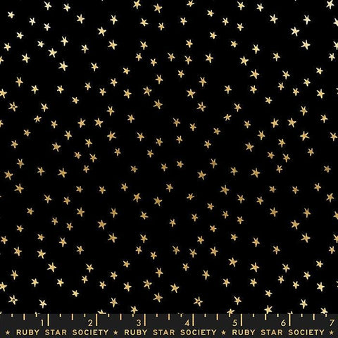 Image of the Starry Blenders Star Black Gold quilting cotton fabric by Alexia Abegg for Moda Fabrics. Features small scattered stars on a black background. Cute Little Fabric Shop