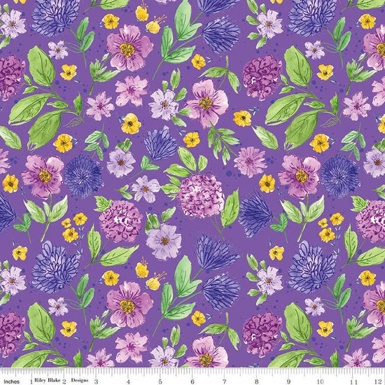 Image of the Wide Back Plum Petals Floral Violet quilting cotton fabric by Riley Blake Designs. Features flowers on a purple background. 
Cute Little Fabric Shop