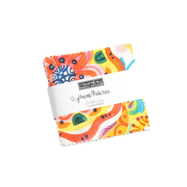 Image of the Flower Patches mini charm pack by Amarilys Henderson for Riley Blake Designs. Features floral fabrics on many backgrounds. 
Cute Little Fabric Shop