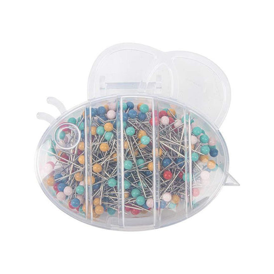 Image of the  Lori Holt Applique Pretty Pins™ by Riley Blake Designs. Features a plastic case with short pins. 
Cute Little Fabric Shop