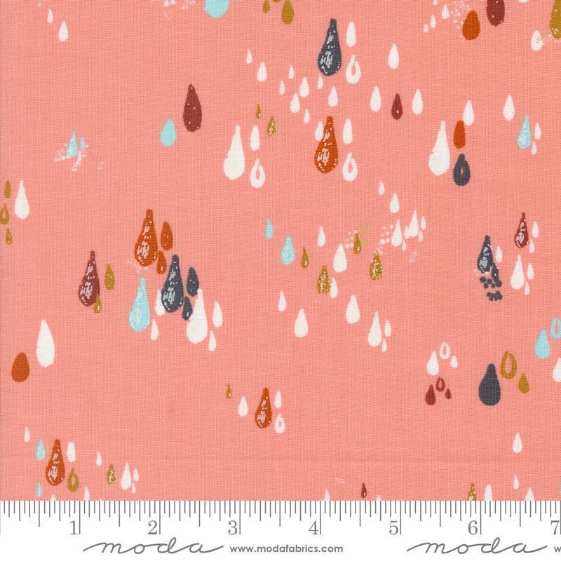 Image of the Things Above Drops Cameo quilting cotton fabric by Fancy That Design House for Moda Fabrics. Features small drops on a coral background. Cute Little Fabric Shop