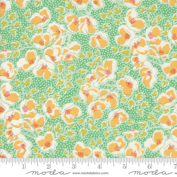 Image of the Portofino Florentine Azure quilting cotton fabric by Fig Tree Co for Riley Blake Designs. Features flowers on a green background. Cute Little Fabric Shop