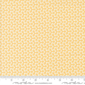 Image of the Portofino Tiles Golden Wheat quilting cotton fabric by Fig Tree Co for Riley Blake Designs. Features abstract swirls on a yellow background. Cute Little Fabric Shop