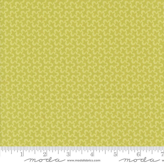 Image of the Portofino Tiles Picholine quilting cotton fabric by Fig Tree Co for Riley Blake Designs. Features abstract swirls on a green background. Cute Little Fabric Shop