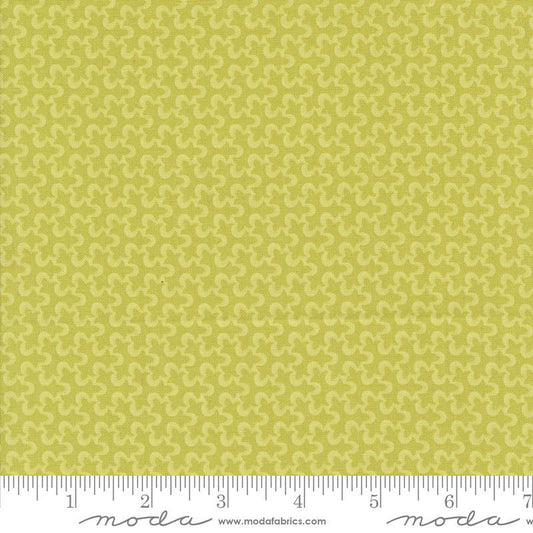 Image of the Portofino Tiles Picholine quilting cotton fabric by Fig Tree Co for Riley Blake Designs. Features abstract swirls on a green background. Cute Little Fabric Shop
