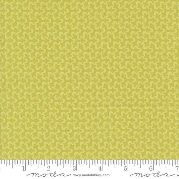 Image of the Portofino Tiles Picholine quilting cotton fabric by Fig Tree Co for Riley Blake Designs. Features abstract swirls on a green background. Cute Little Fabric Shop