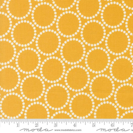 Image of the Love Letter Dots Golden quilting cotton fabric by Lizzy House for Moda Fabrics. Features dotted circles on a yellow background. Cure Little Fabric Shop