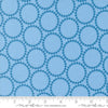 Image of the Love Letter Dots Blue Skies quilting cotton fabric by Lizzy House for Moda Fabrics. Features dotted circles on a blue background. Cure Little Fabric Shop