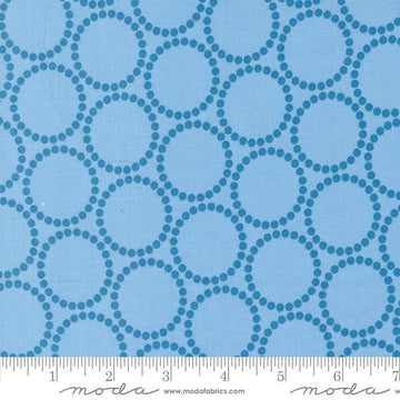 Image of the Love Letter Dots Blue Skies quilting cotton fabric by Lizzy House for Moda Fabrics. Features dotted circles on a blue background. Cure Little Fabric Shop