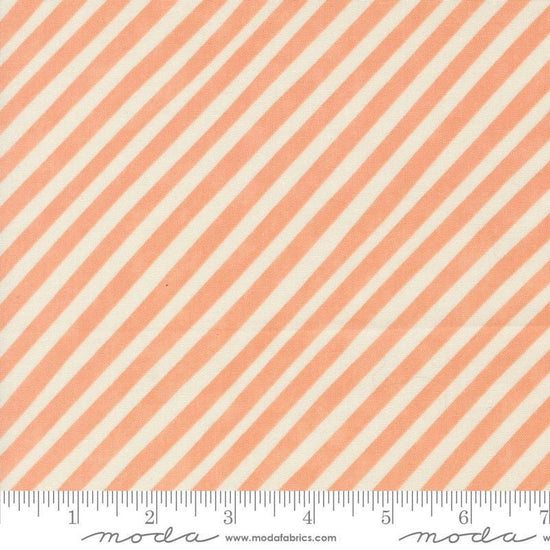 Image of the Love Letter Stripes Peach quilting cotton fabric by Lizzy House for Moda Fabrics. Features diagonal stripes on a coral background. Cure Little Fabric Shop