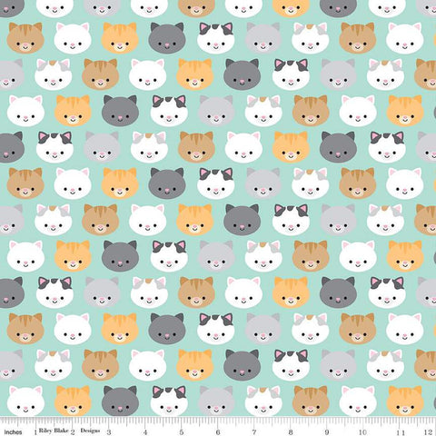 Image of the Pretty Kitty™ Kitties Blue quilting cotton fabric by Doodlebug Design Inc for Riley Blake Designs. Features kitty heads on a blue background. Cute Little Fabric Shop