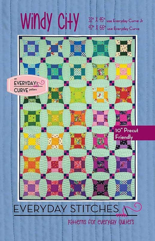 Image of the Windy City quilt pattern by Everyday Stitches for Moda Fabrics. Features a rainbow patterned quilt. 
Cute Little Fabric Shop