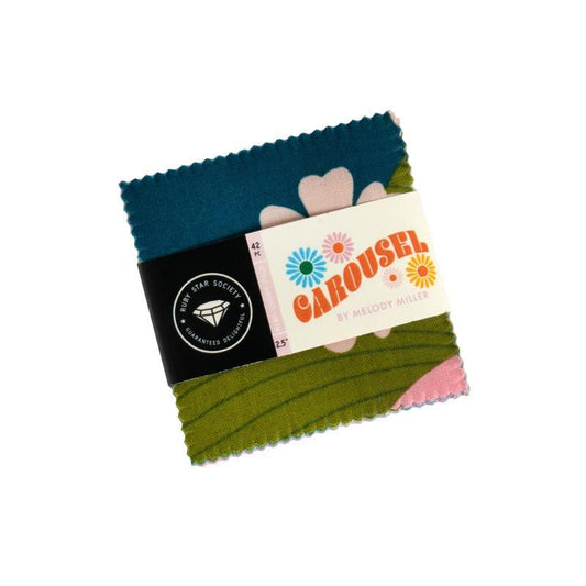 Image of the Carousel fat quarter bundle by Ruby Star Society for Moda Fabrics. Features bright colored fabrics. 
Cute Little Fabric Shop