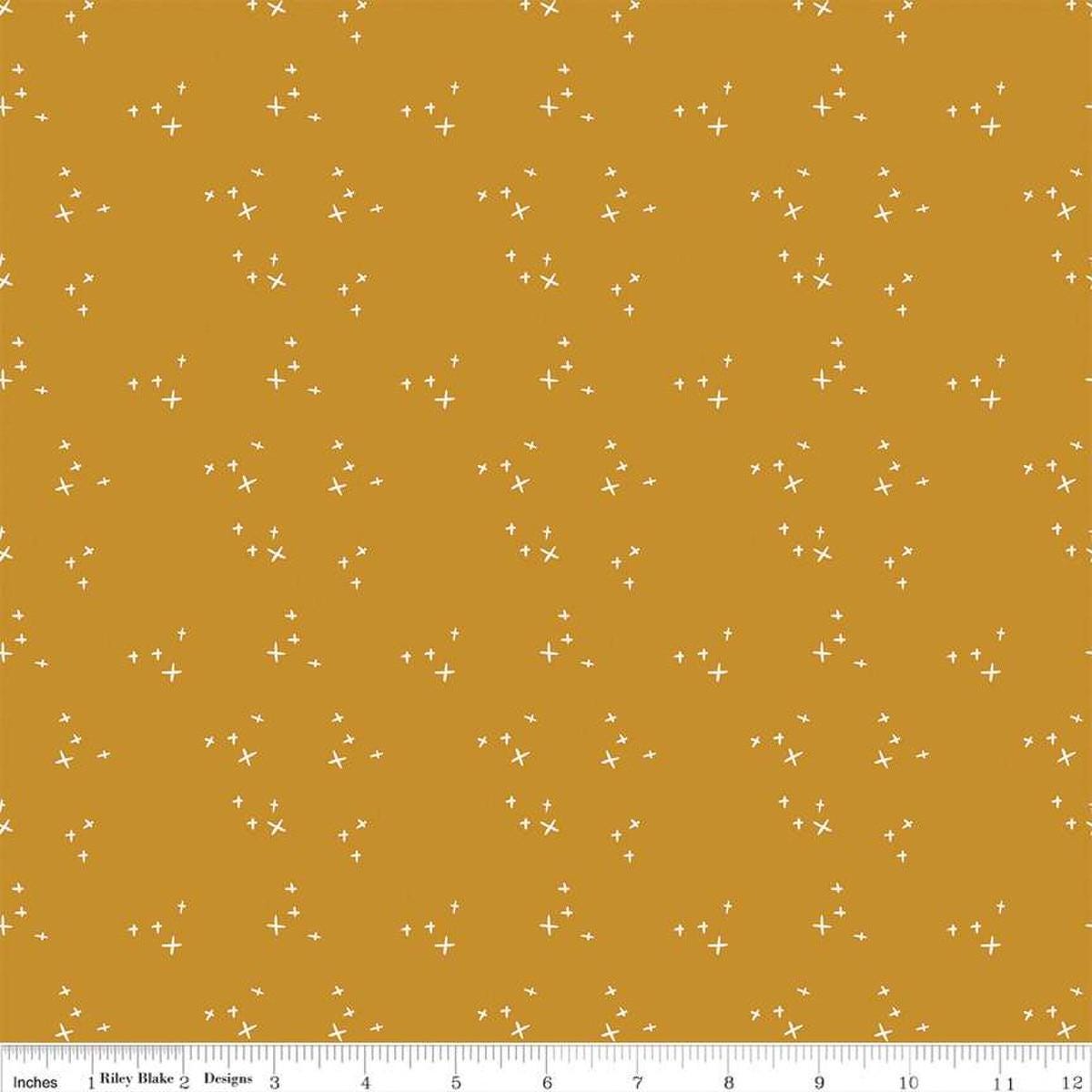 Blush 'n Butterscotch Cross Sparkles Butterscotch quilting cotton fabric by Simple Simon & Company for Riley Blake Designs. Features small sparkle crosses on a gold background. Cute Little Fabric Shop