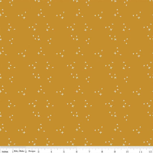 Blush 'n Butterscotch Cross Sparkles Butterscotch quilting cotton fabric by Simple Simon & Company for Riley Blake Designs. Features small sparkle crosses on a gold background. Cute Little Fabric Shop