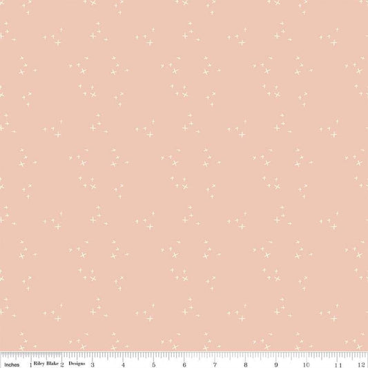 Blush 'n Butterscotch Cross Sparkles Blush quilting cotton fabric by Simple Simon & Company for Riley Blake Designs. Features small sparkle crosses on a pink background. Cute Little Fabric Shop