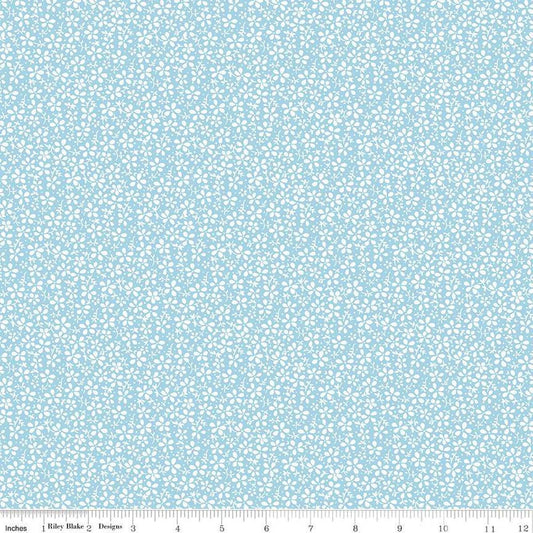 Image of the Precious Petites Daisies Sky quilting cotton fabric by Gerri Robinson for Riley Blake Designs. Features flowers on a blue background. Cute Little Fabric Shop