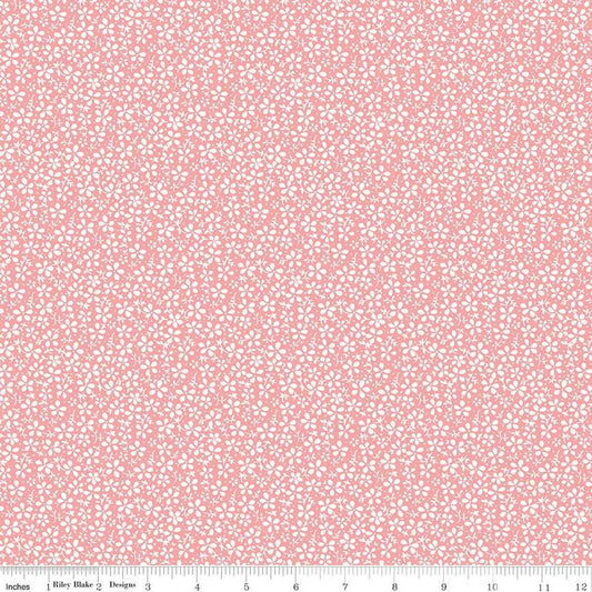 Image of the Precious Petites Daisies Coral quilting cotton fabric by Gerri Robinson for Riley Blake Designs. Features flowers on a pink background. Cute Little Fabric Shop