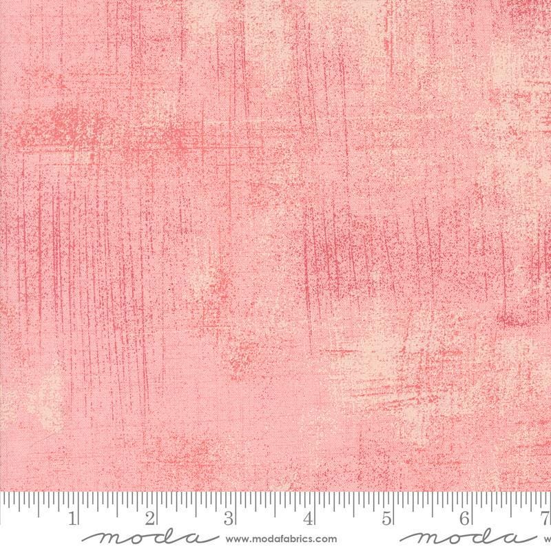 Image of the Sunday Brunch Grunge Basics Parfait quilting cotton fabric by Moda Fabrics. Features a textured pattern on a pink background. Cute Little Fabric Shop