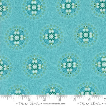 Image of the Sunday Brunch Geometrics Mint Tea quilting cotton fabric by Moda Fabrics. Features medallions on a teal background. Cute Little Fabric Shop