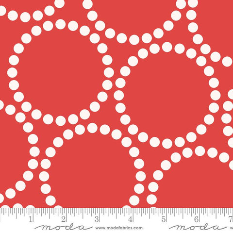 Image of the Pearl Bracelet Red quilting cotton fabric by Lizzy House for Moda Fabrics. Features circles made up of small dots on a red background. 
Cute Little Fabric Shop