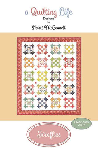 Image of the Fireflies  quilt pattern by Sherri McConnell for Moda Fabrics. Features star blocks on a quilt. 
Cute Little Fabric Shop