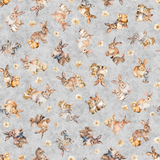 Image of the Hunny Bunny Tossed Bunnies Gray quilting cotton fabric by Morris Creative Group by QT Fabrics. Features bunnies on a gray background. Cute Little Fabric Shop