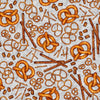 Image of the Brewmaster Pretzels Gray quilting cotton by QT Fabrics. Features pretzels on a gray background. Cute Little Fabric Shop