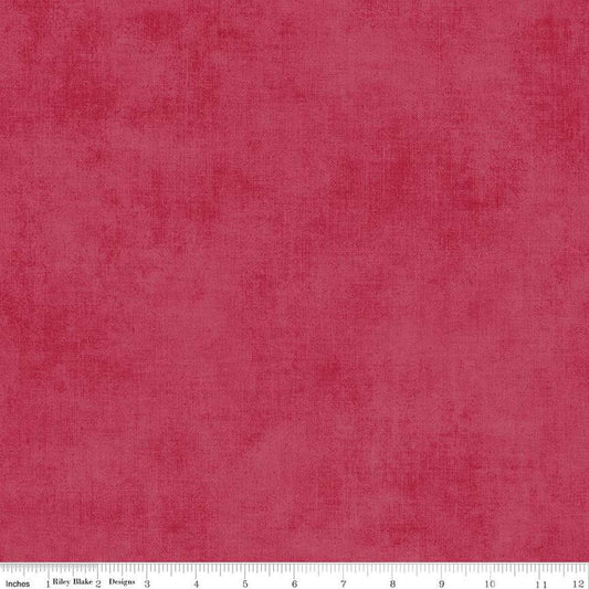 Image of the Wide Back Shades Wagon Red quilting cotton fabric by Riley Blake Designs. Features a textured fabric on a red background. 
Cute Little Fabric Shop