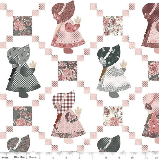 Image of the Wide Back A Walk on the Prairie Sunbonnet Sue White quilting cotton fabric by Modern Prairie for Riley Blake Designs. Features sunbonnet sue dolls on a quilt. 
Cute Little Fabric Shop