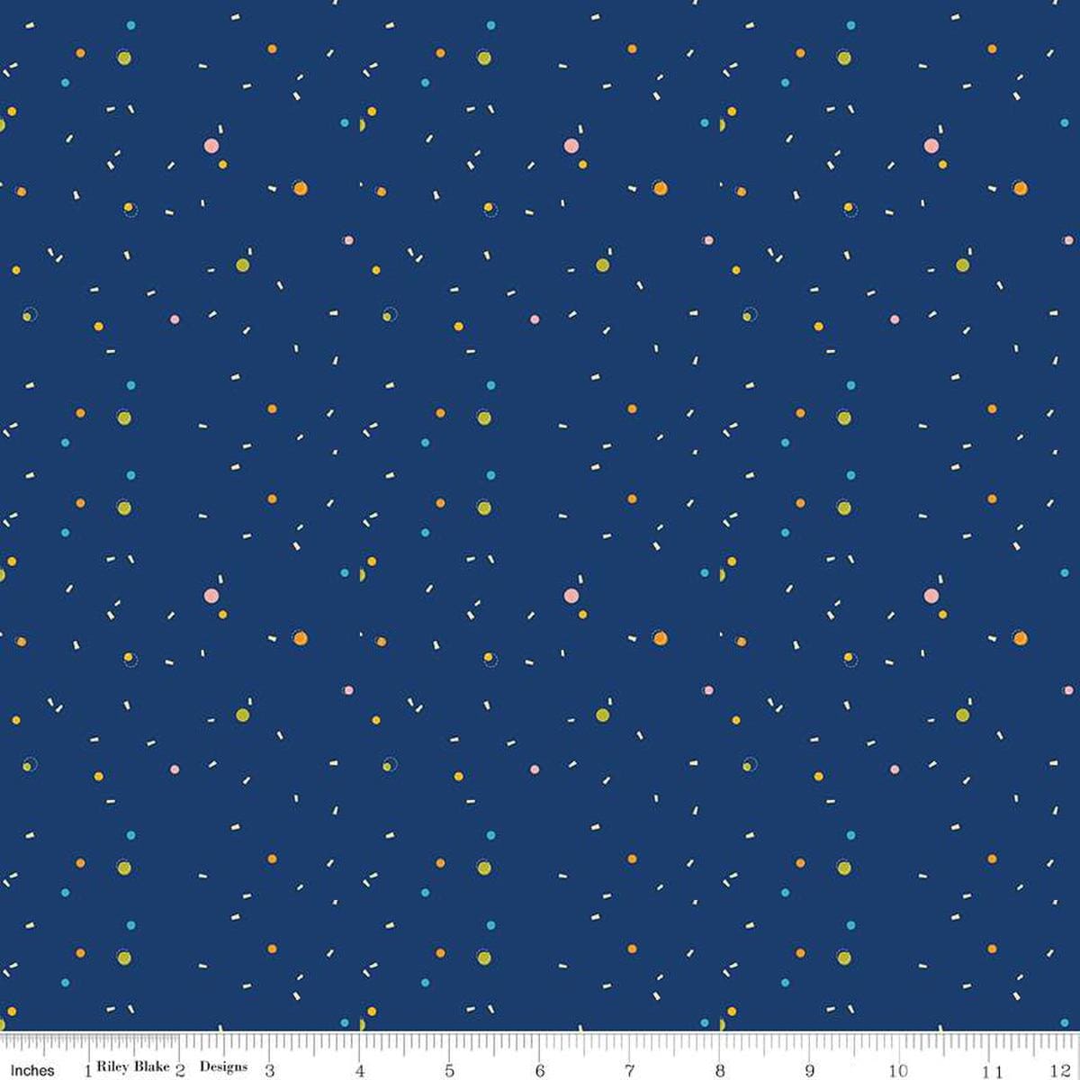 Image of the Pop 'n Play Confetti Navy quilting cotton fabric by Fisher-Price for Riley Blake Designs. Features spots on a blue background. Cute Little Fabric Shop