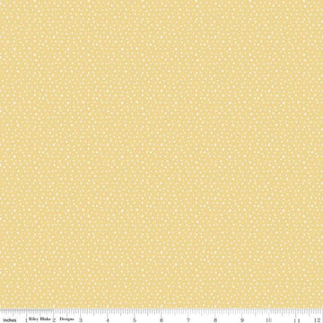 Image of the Love Me More Seeds Yellow quilting cotton fabric by Lisa Audit for Riley Blake Designs. Features circles on a yellow background. Cute Little Fabric Shop