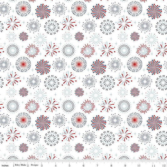 Image of the Stars and Stripes Forever Fireworks White quilting cotton fabric by Lori Whitlock for Riley Blake Designs. Features fireworks on a white background. Cute Little Fabric Shop