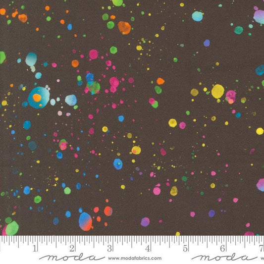 Image of the Gradients Euphoria Midnight quilting cotton wide back fabric by Moda Fabrics. Features rainbow splatters. 
Cute Little Fabric Shop