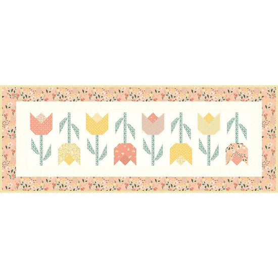 Image of the Tulip Festival Runner Boxed Kit by Sandy Gervais for Riley Blake Designs. Features flowers on a runner quilt. 
Cute Little Fabric Shop