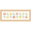 Image of the Tulip Festival Runner Boxed Kit by Sandy Gervais for Riley Blake Designs. Features flowers on a runner quilt. 
Cute Little Fabric Shop