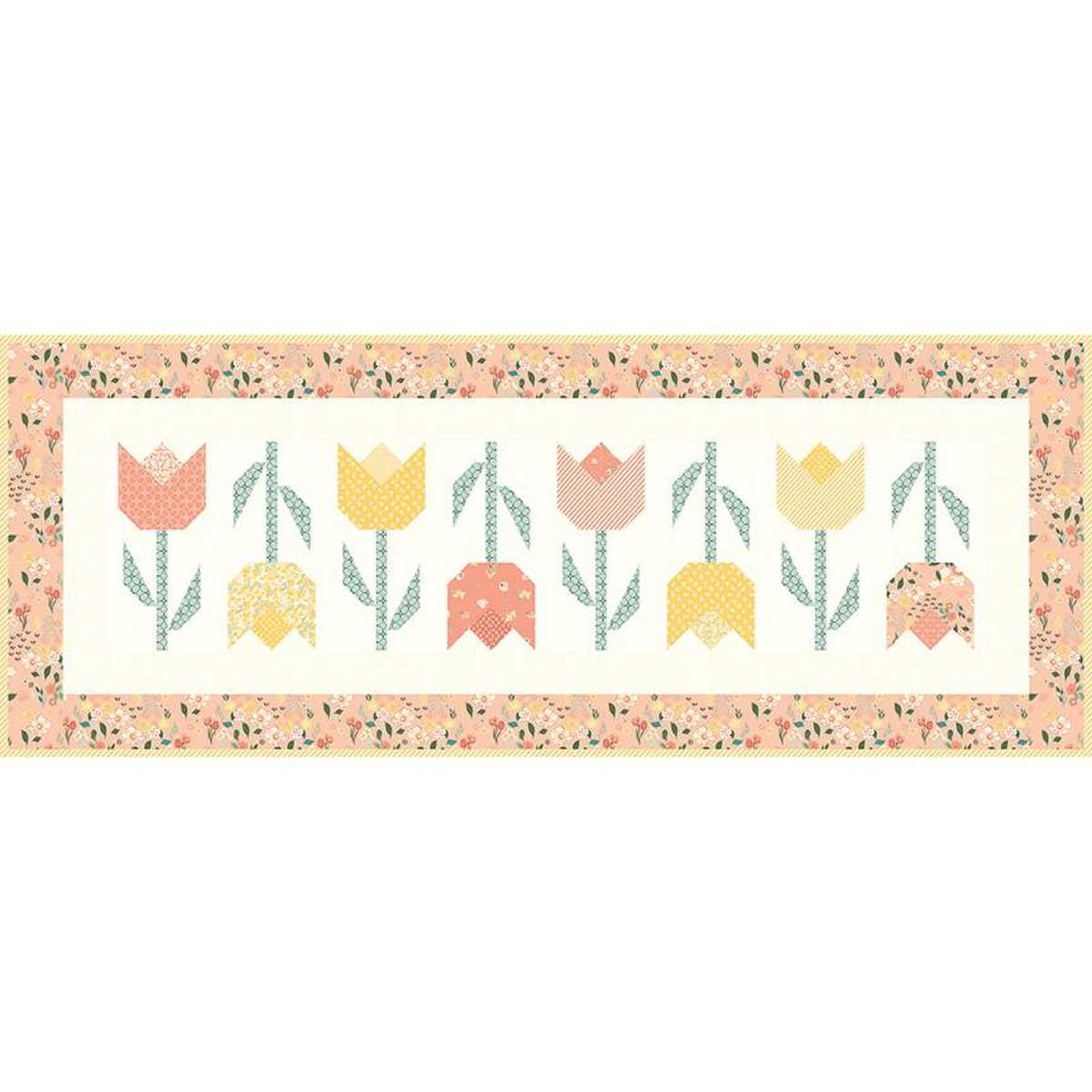 Image of the Tulip Festival Runner Boxed Kit by Sandy Gervais for Riley Blake Designs. Features flowers on a runner quilt. 
Cute Little Fabric Shop