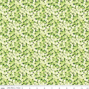 Image of the Sewing Seeds III Phlox Petals Green quilting cotton fabric by Lori Holt for Riley Blake Designs. Features flowers on a green background. Cute Little Fabric Shop