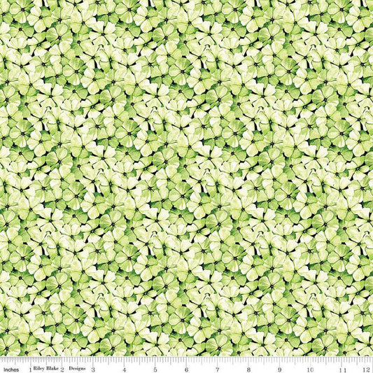 Image of the Sewing Seeds III Phlox Petals Green quilting cotton fabric by Lori Holt for Riley Blake Designs. Features flowers on a green background. Cute Little Fabric Shop