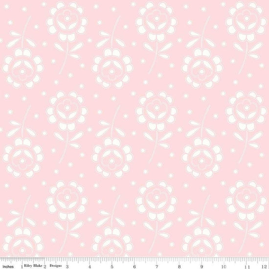 Image of the Sewing Seeds III Rose Cutwork Pink quilting cotton fabric by Lori Holt for Riley Blake Designs. Features flowers on a pink background. Cute Little Fabric Shop